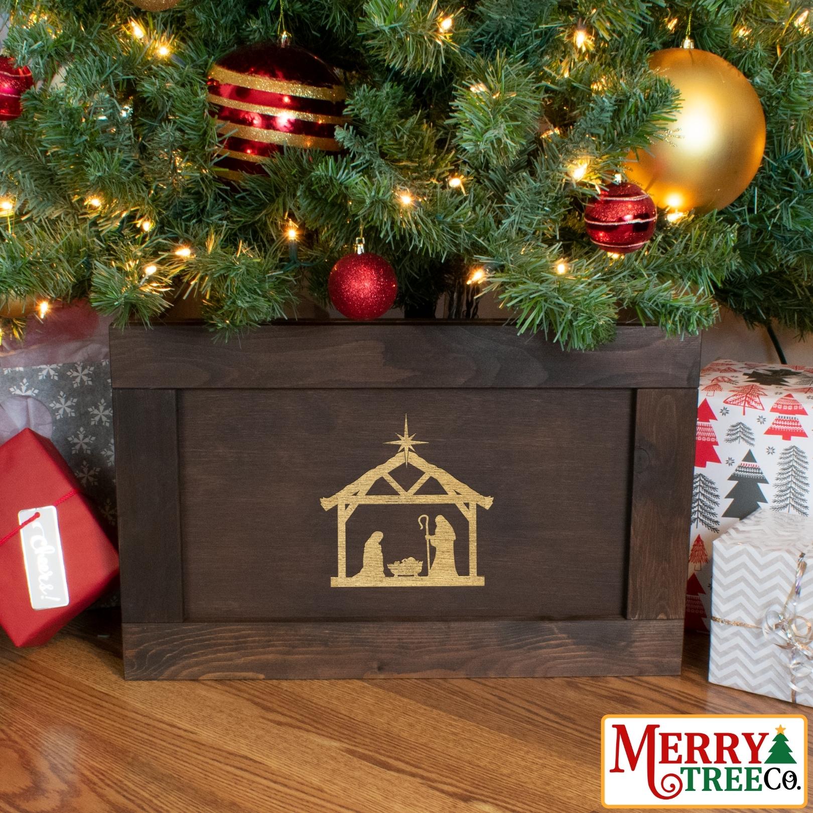 Manger engraved on drak brown christmas box.